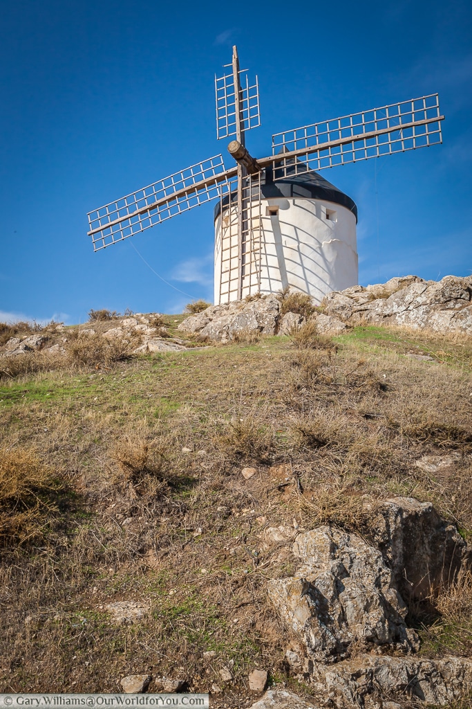 A solitary windmill overlooking Consuegra, La Mancha, Spain