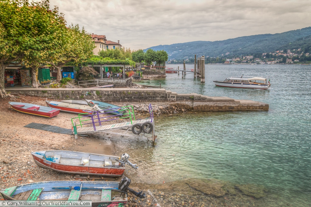 Boats moored up on Isola del Pescatori, Piedmont, Italy