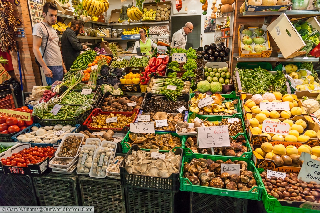 A grocer's stall in the Mercado de Triana, Seville, Spain