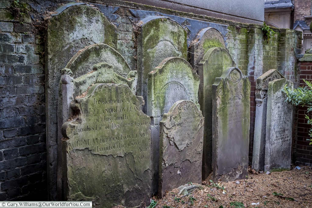 Gravestones at St Botolph's Aldersgate within the Postman's Park, City of London, UK