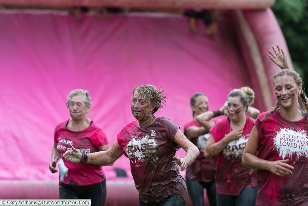 The final push at the Pretty Muddy Cancer Research event, Cardiff, UK