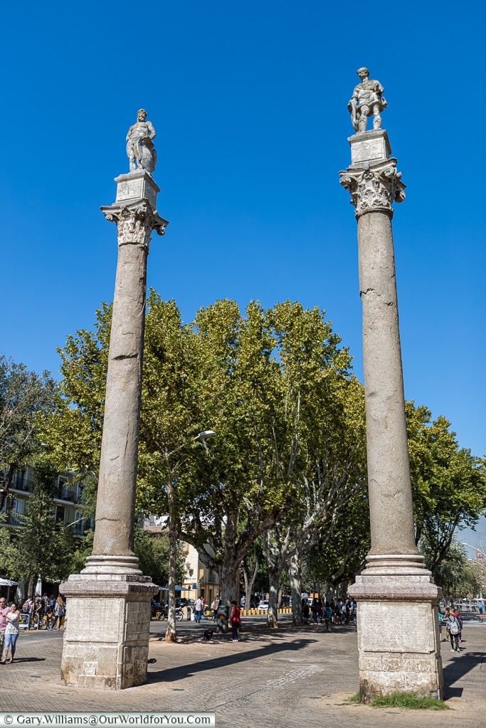 Two columns stand at one end of Alameda de Hércules, Seville, Spain