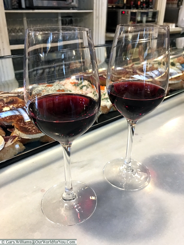 Two glasses of red wine at the Mercado del Este, Santander, Spain