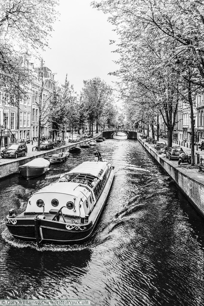 A party barge on the canals of Amsterdam, Amsterdam, The Netherlands