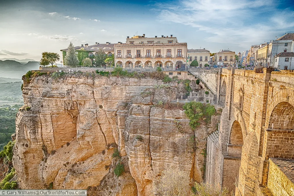 A view of the Parador de Ronda, with the Puente Nuevo spanning the gorge in Ronda, Spain