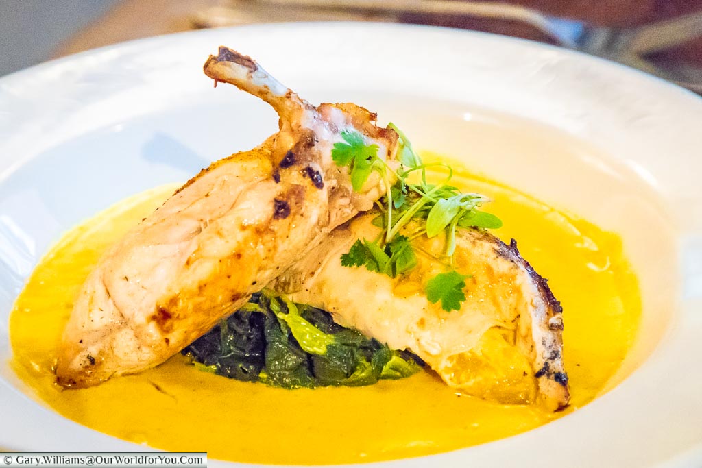 A main dish of chicken in lime with a mango & curry sauce at the Vintners Restaurant on Sheep Street in Stratford-upon-Avon