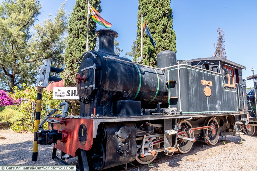 A small steam locomotive, a little weathered, called the Rhodesia.