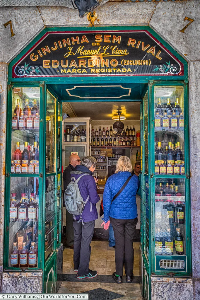 Queuing for a shot of Ginjinha Sem Rival at a tiny little shop in the centre of Lisbon, Portugal