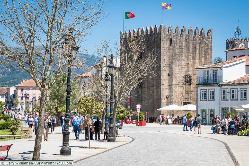 A view along the streets of Ponte de Lima, with the Torre da Cadeia Velha, or the Old Prison Tower, in the background.