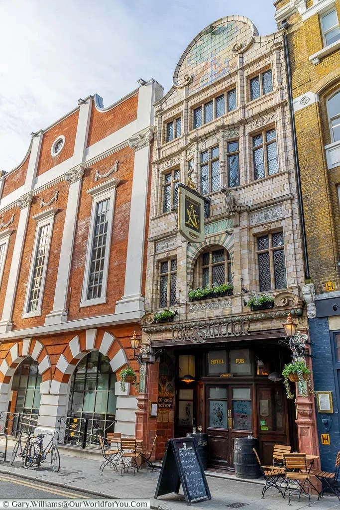 The Fox & Anchor pub, a stone's throw from Smithfield Meat Market, Which is one of the few remaining early opening pubs that serve alcohol with a full English breakfast to the market porters