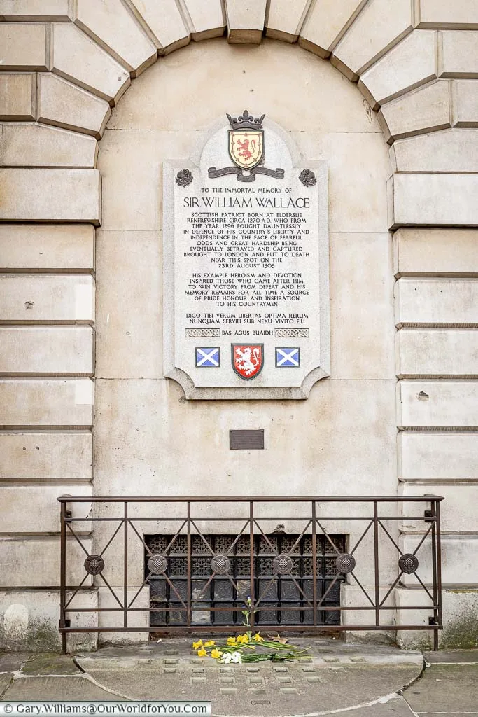A stone plaque memorial to the Scottish hero Sir Williams Wallace, close to the spot he was put to death in the Smithfield district of the City of London