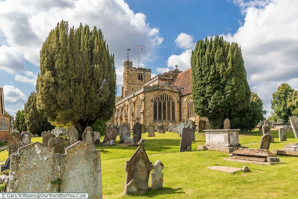 A view over the graveyard towards the apex end the Saint Dunstan's church in Cranbrook on a beautiful sunny day