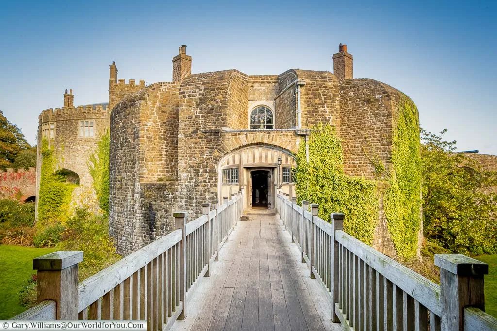 The wooden bridge across the moat to the ivy-covered Walmer Castle