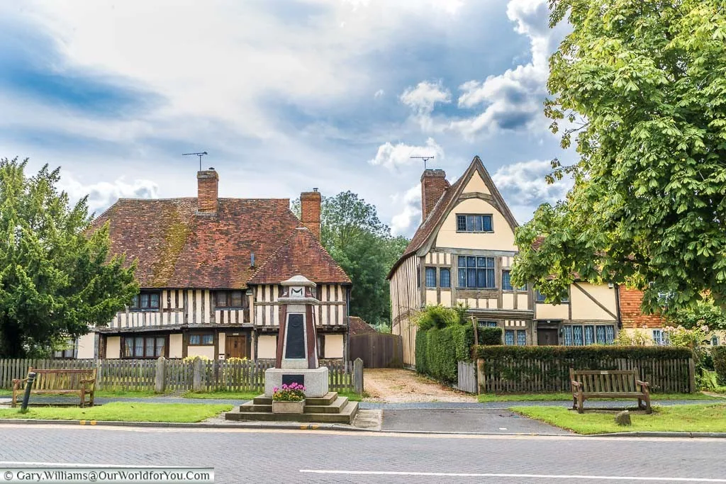Looking across the High Street to ‘The Chequers’ and Shakespeare's house, behind the village War Memorial