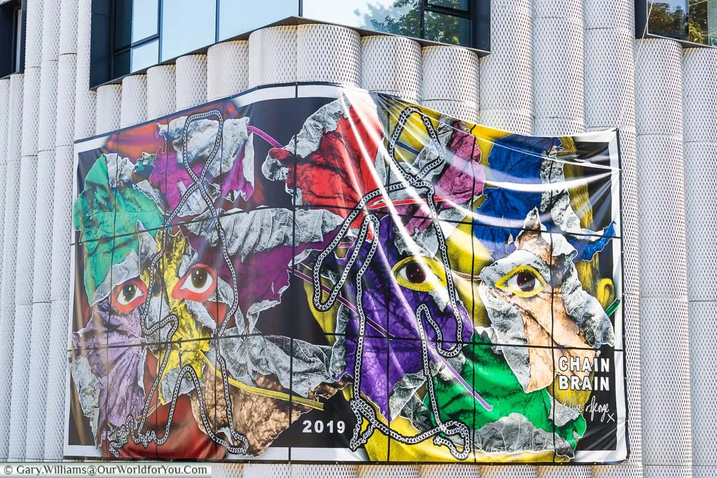 An art banner called 'CHAIN BRAIN' attached to the Quarterhouse in Folkestone's Creative Quarter