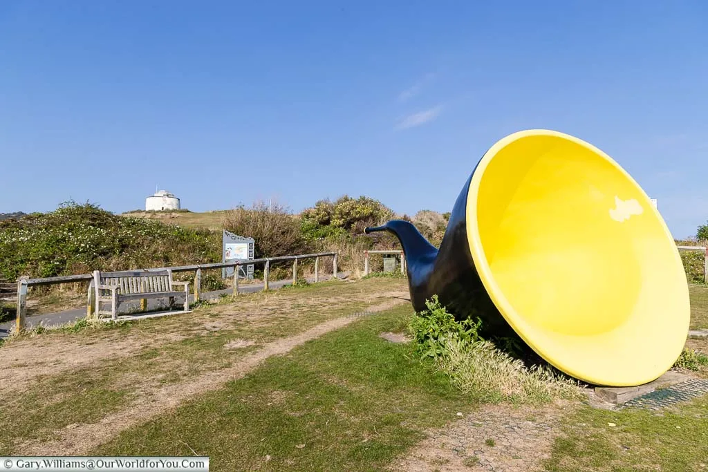 The Siren art installation on the cliffs overlooking Folkestone that looks like a giant, yellow-lined, blue ear trumpet.