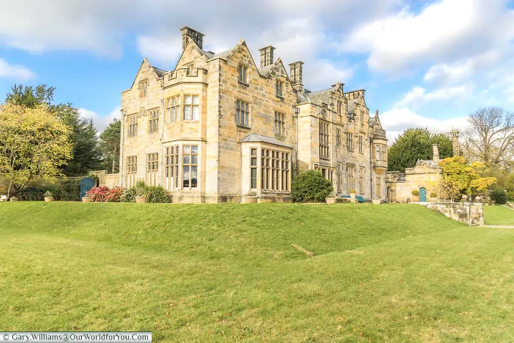 The 19th century Tudor revival styled Scotney House in golden Kentish ragstone