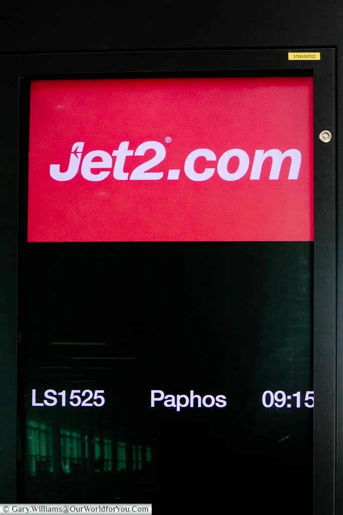 The departure board for the Jet2 flight from Stansted airport to Pathos, Cyprus