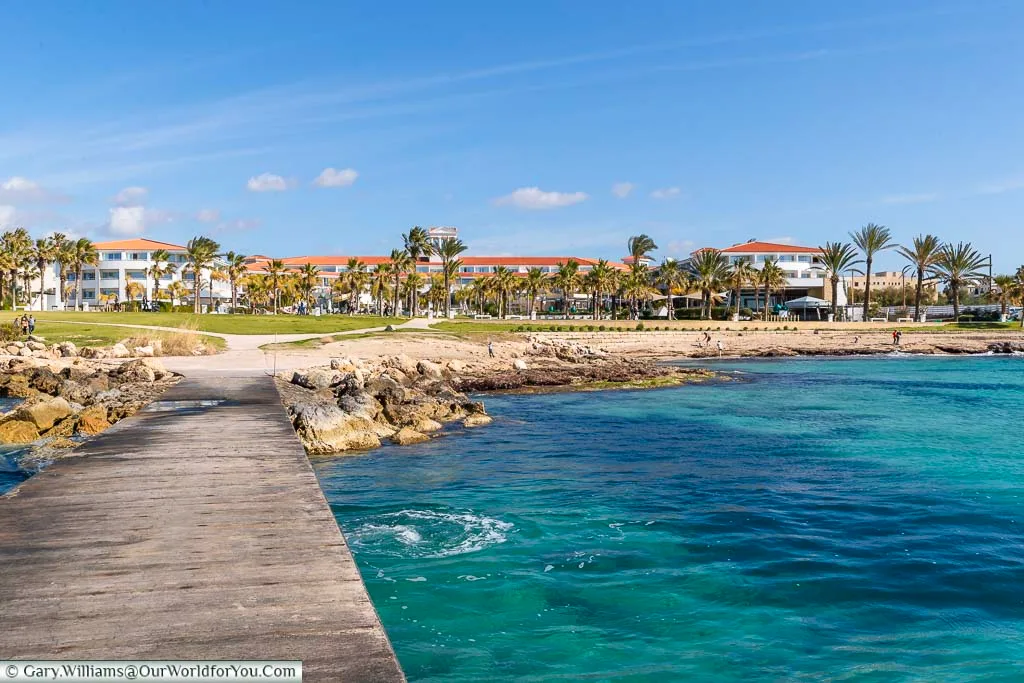 The view from the jetty into the Mediterranean sea back to the Olympic Lagoon Resort Paphos
