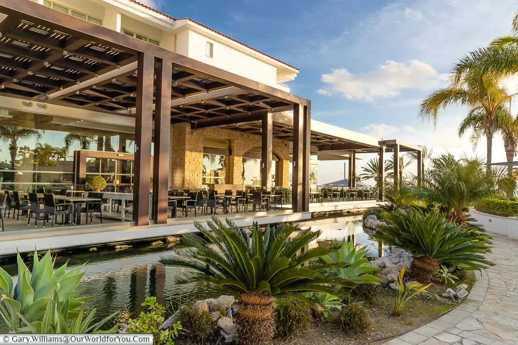 The landscaped waterfront to the outside seating area of the Royal Olympic restaurant