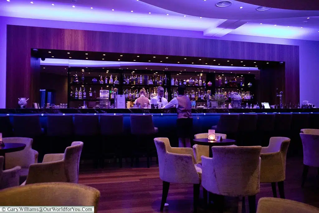 Inside the neon-lit You & Me Bar at the Olympic Lagoon Resort Paphos