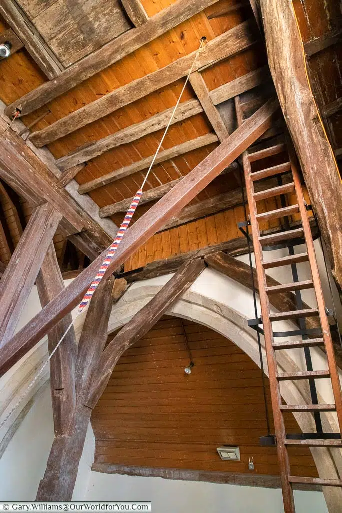 A rope and ladder leading up into the bell tower of St. Eanswith, Brenzett on the Romney Marsh in Kent