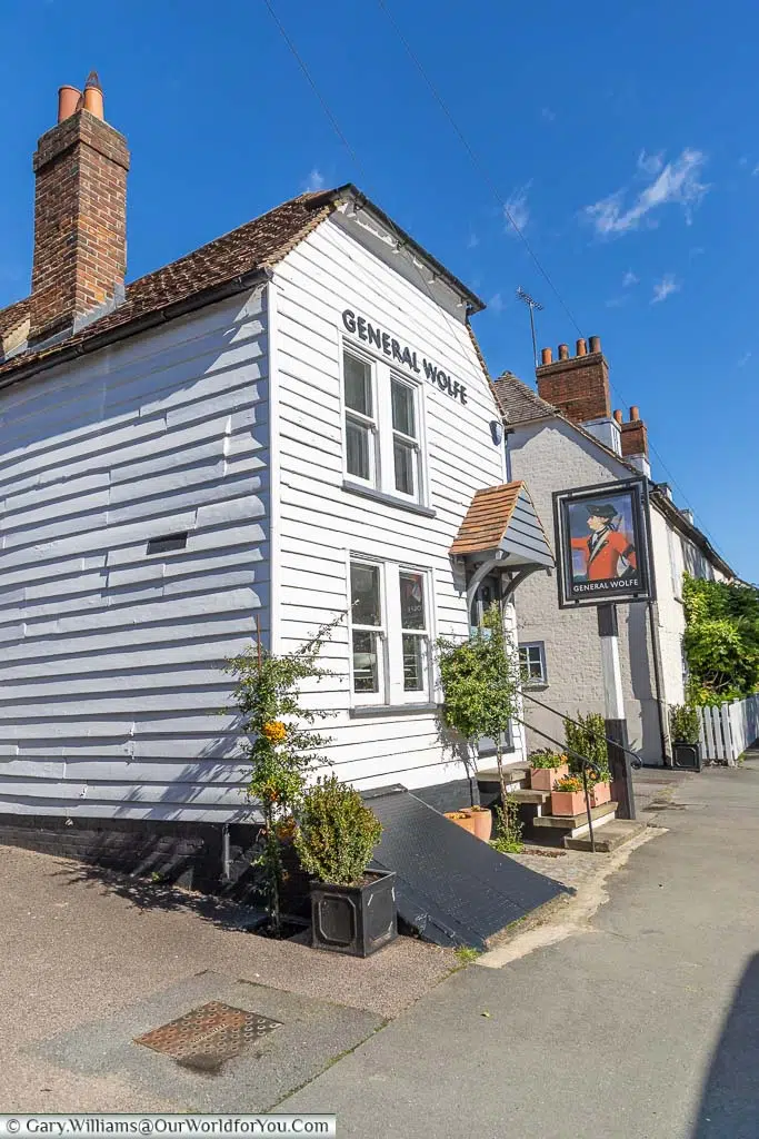 The white weatherboarded former General Wolfe Inn on the outskirts of Westerham, Kent