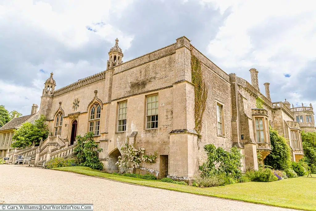 The exterior of Lacock Abbey with its grand staircase leading to the entrance