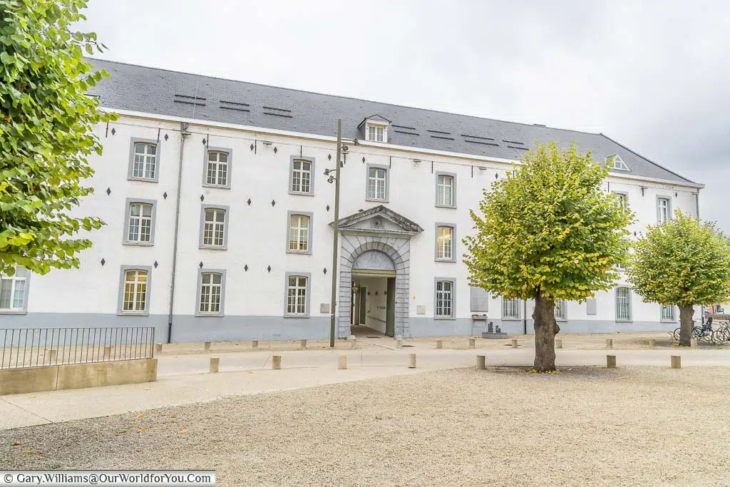 The white brick building that was once part of the Nazi complex to deport those it deemed sub-human to Auschwitz and other concentration camps from Mechelen.