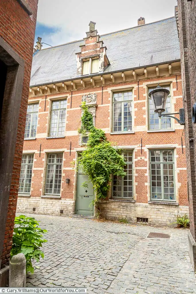 The cobbled lanes of the Beguinage at the entrance of the Het Anker brewery in Mechelen, Belgium.