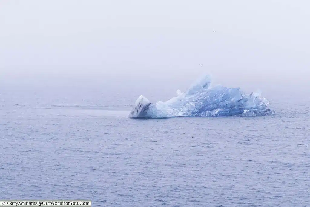 A chuck of ice broken off the glacier in the Jökulsárlón glacial lagoon, Iceland