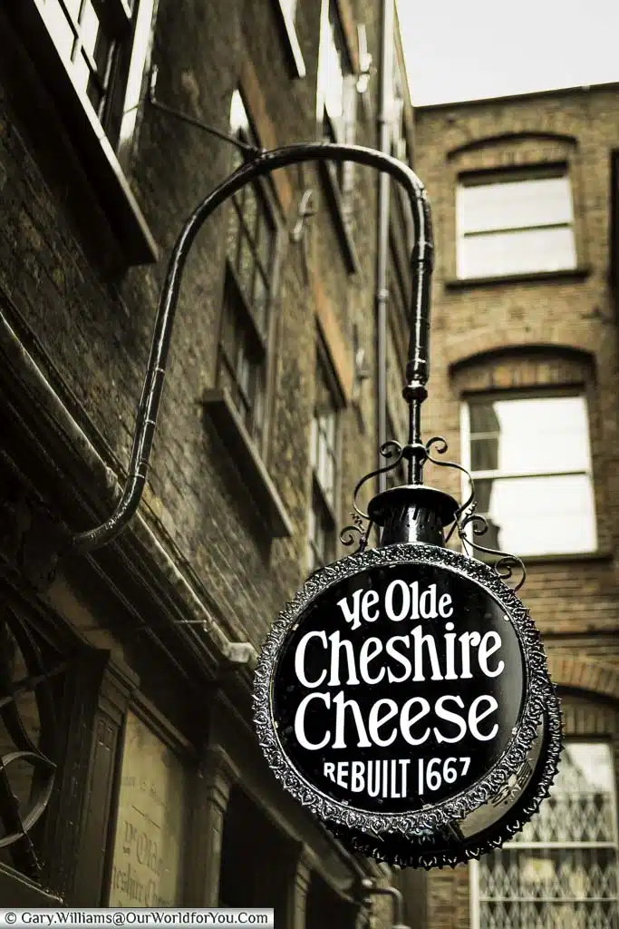 A sign to the Ye Olde Cheshire Cheese public house stating it was rebuilt in 1667 (After the Great fire of London)