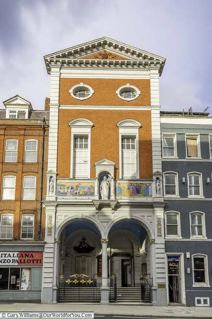 The facade to Saint Peter's Italian church in Clerkenwell. Easily overlooked, this church continues to serve the region's Italian community.