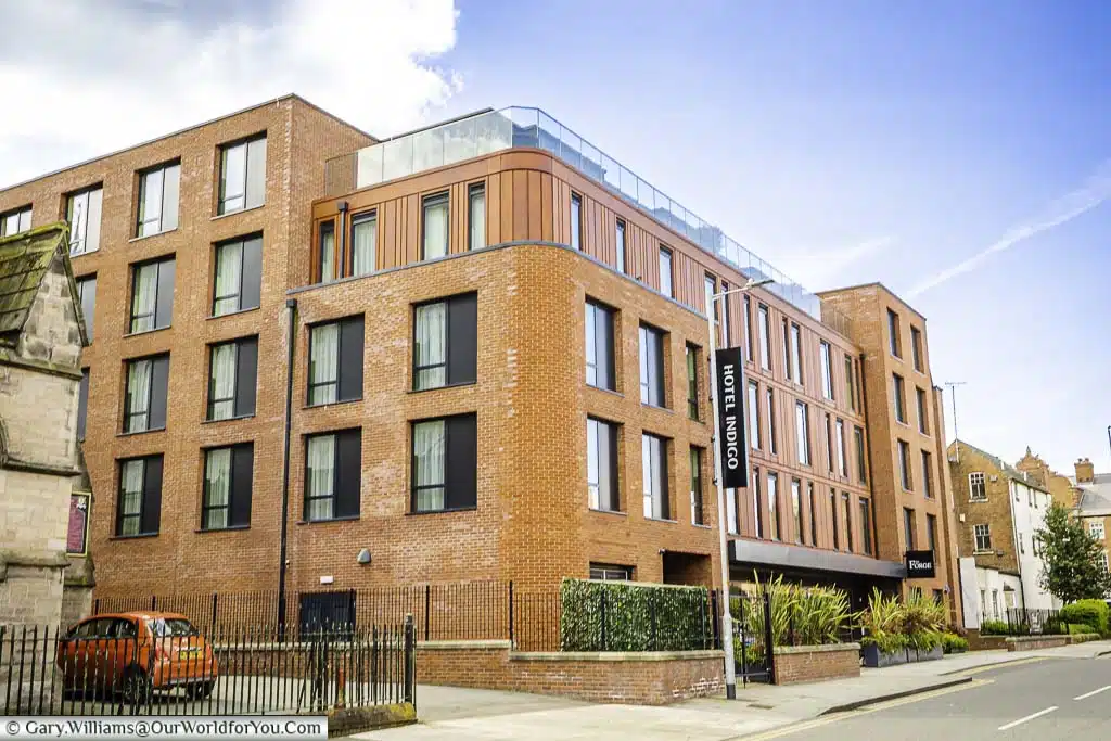 The reb brick exterior of the hotel indigo in chester, cheshire