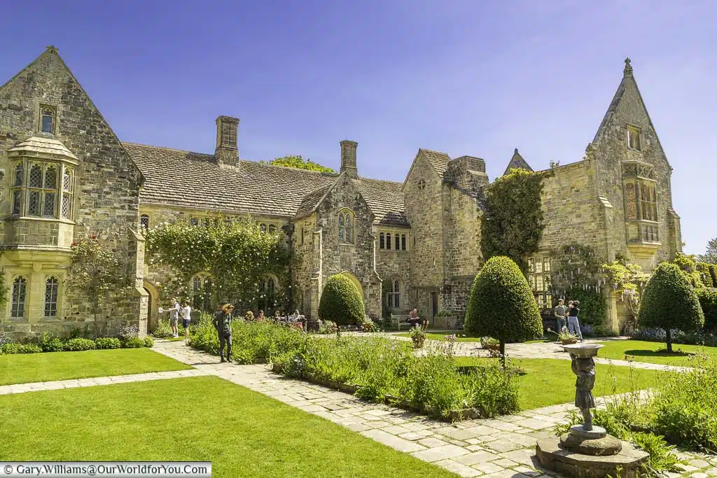 The view of the national trust nymans country house from the forecourt garden in west sussex, england