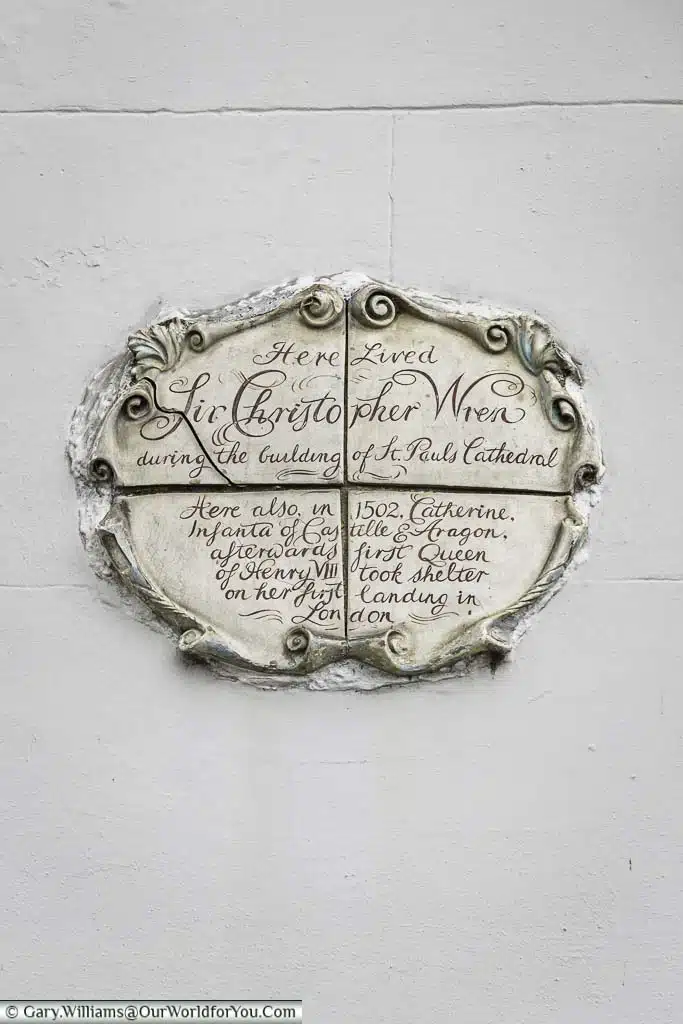 A historical plaque on a building in Cardinal Wharf in london's bankside marking the place christopher wren once lived