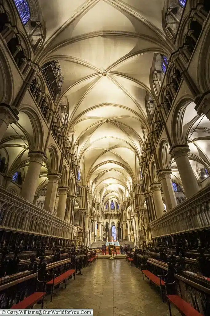 Looking towards the altar from the vaulted nave of Canterbury Cathedral.
