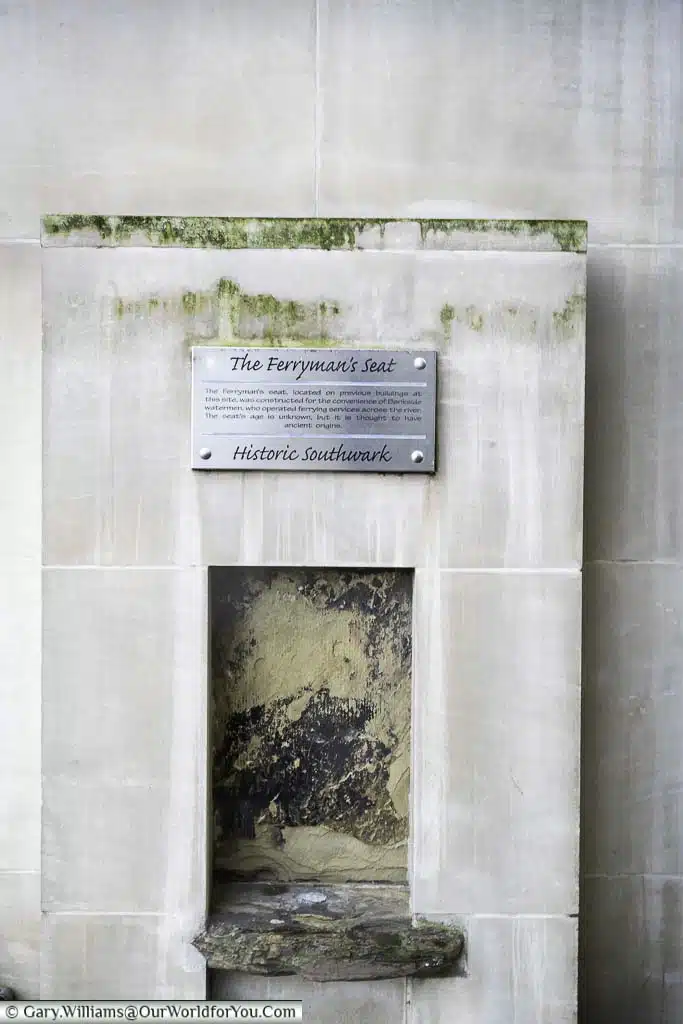 The ancient ferryman's seat set into a modern building on london's bankside