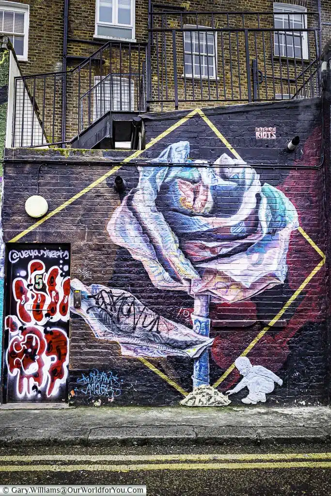An Origami Rose street art by Airborne Mark in Hawley Mews, Camden