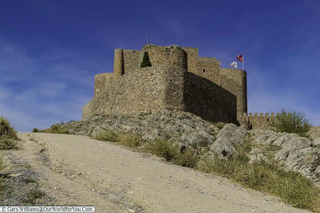 Up close to the ancient Consuegra castle atop a ridge in La Mancha, Spain