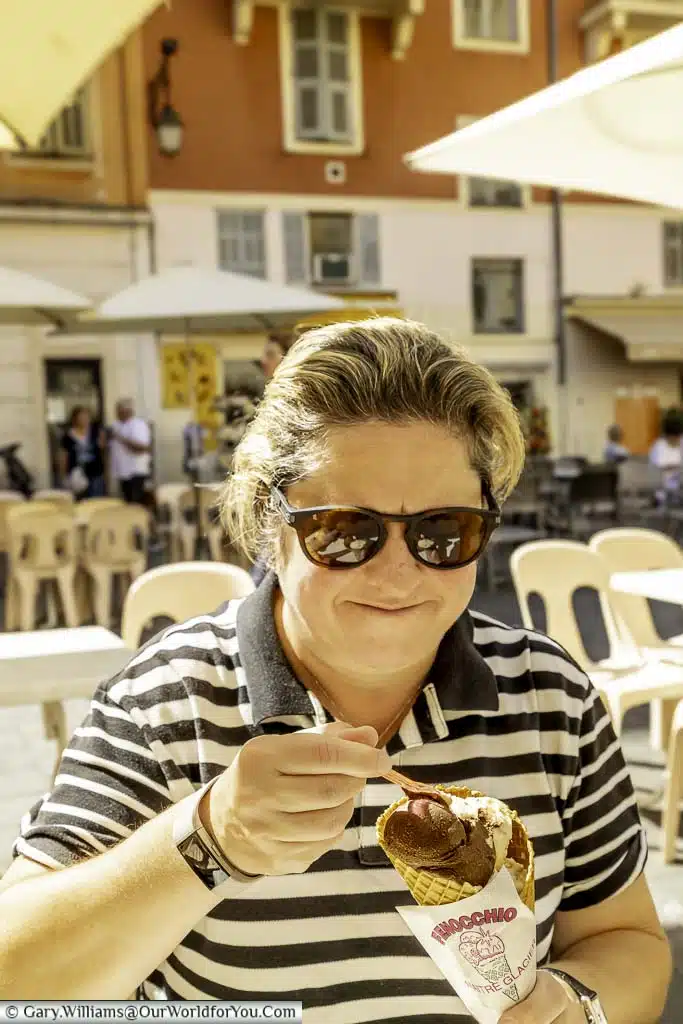 A smiling Janis, tucking into an ice-cream cone in Nice