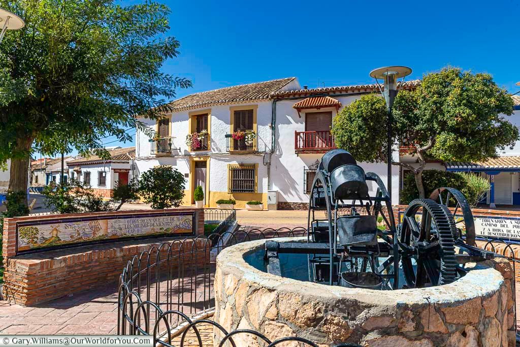 A water feature in the centre of plaza de la constitucion in Puerto Lapice, Spain.