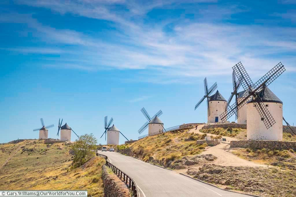 The long, uphill road at consuegra lined by seven ancient windmills of la mancha