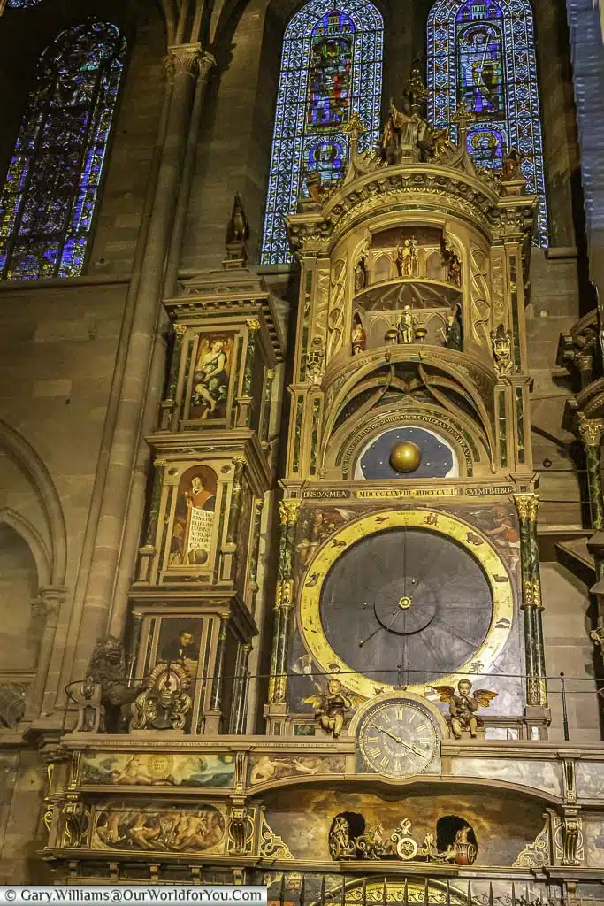 The immensely ornate, 19th century, astrological clock standing over 10 meters tall, with multiple faces telling different astrological details.