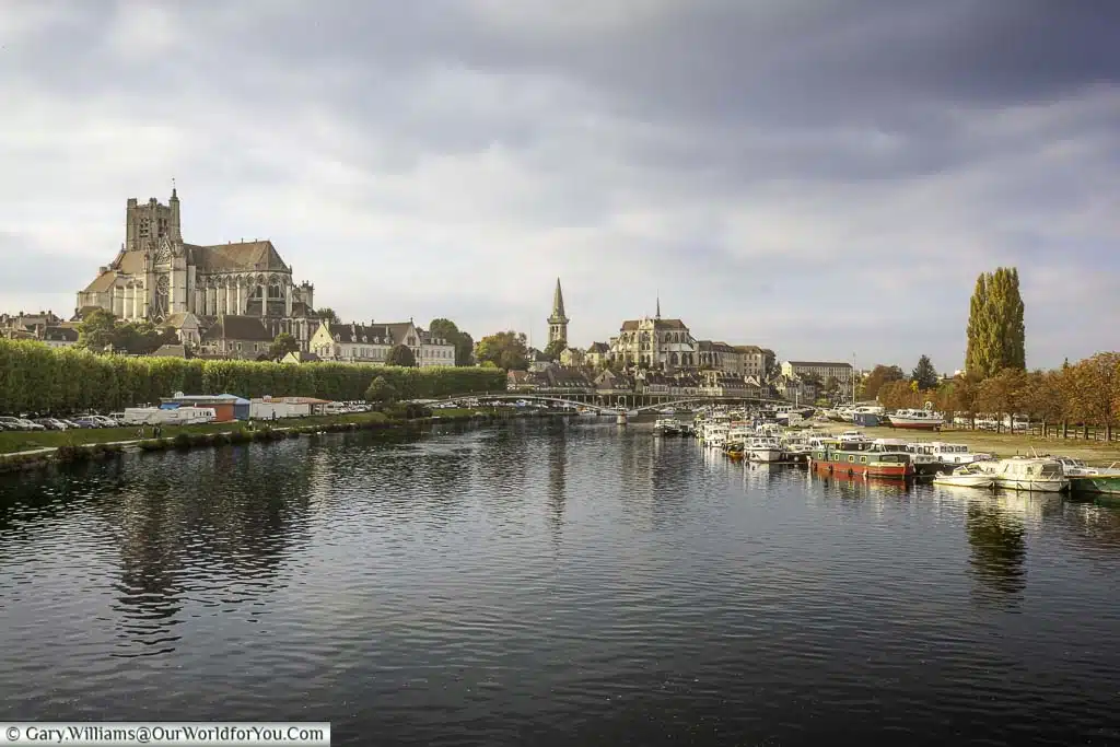 A view of Auxerre in France from the Pont Paulbert across the River Yonne to the Cathédrale Saint-étienne d'Auxerre, the town and the quayside