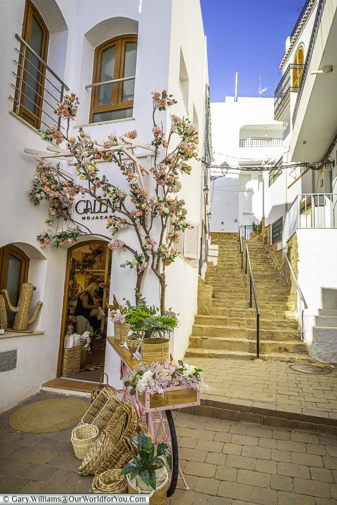 A pretty shop next to some steep steps in the old town mojácar, andalucia, spain