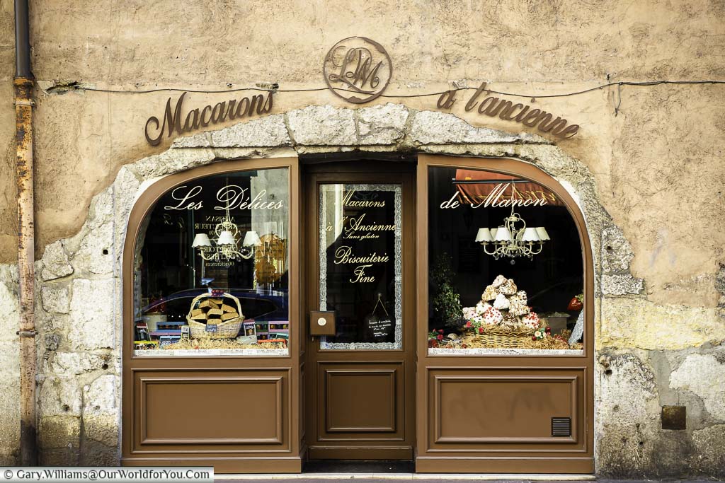 A traditional macaron shop in a side street in Annecy. Shop windows are full of tempting local sweet delicacies.