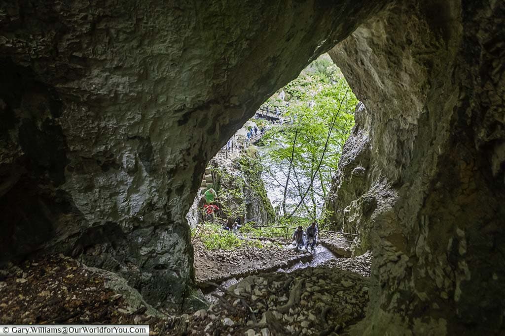 A view out of the entrance of the bat cave to the footpaths around plitvice lakes in croatia
