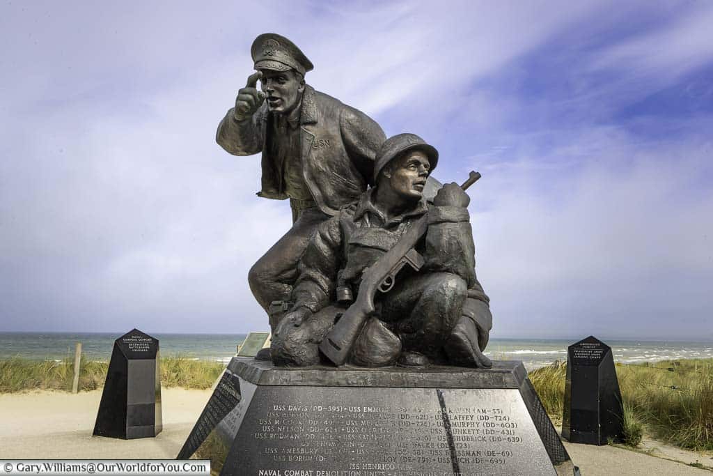 A statue of two soldiers at the memorial on Utah Beach.