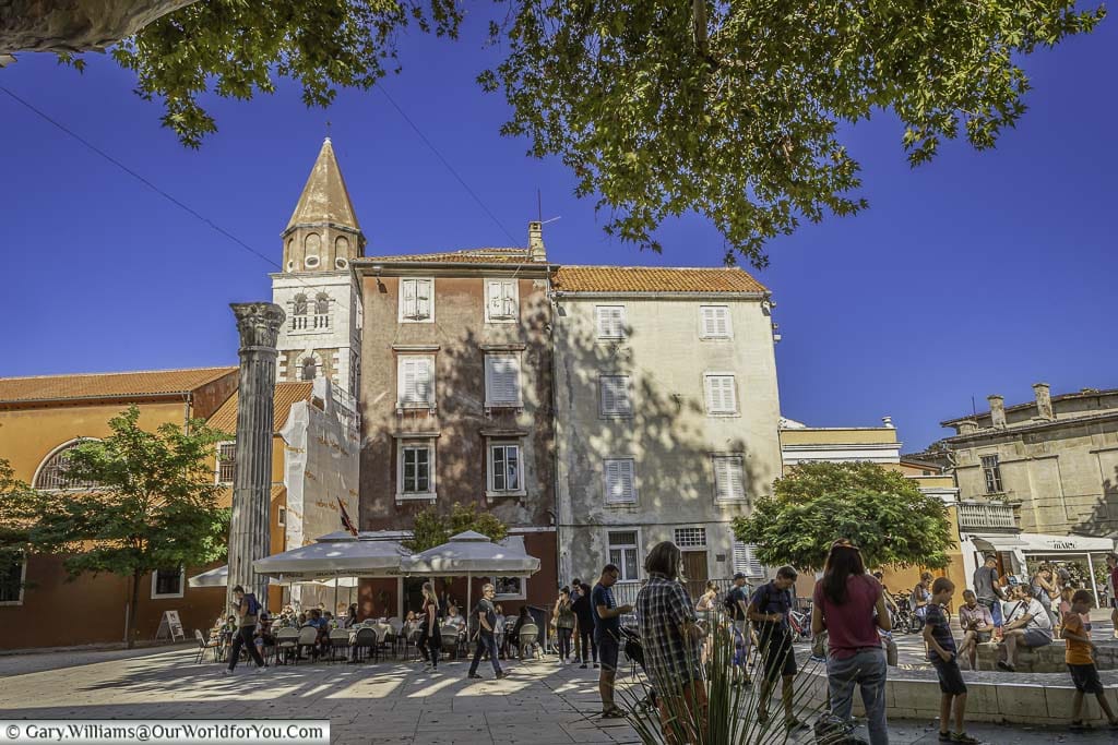 People gathred around around Trg Petra Zoranića in the old town of Zadar